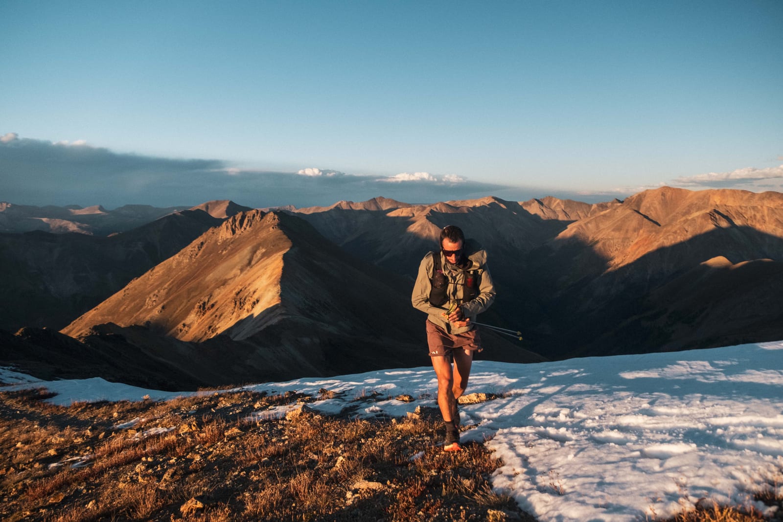Kilian Jornet on a Colorado ridge in golden light during the States of Elevation project.