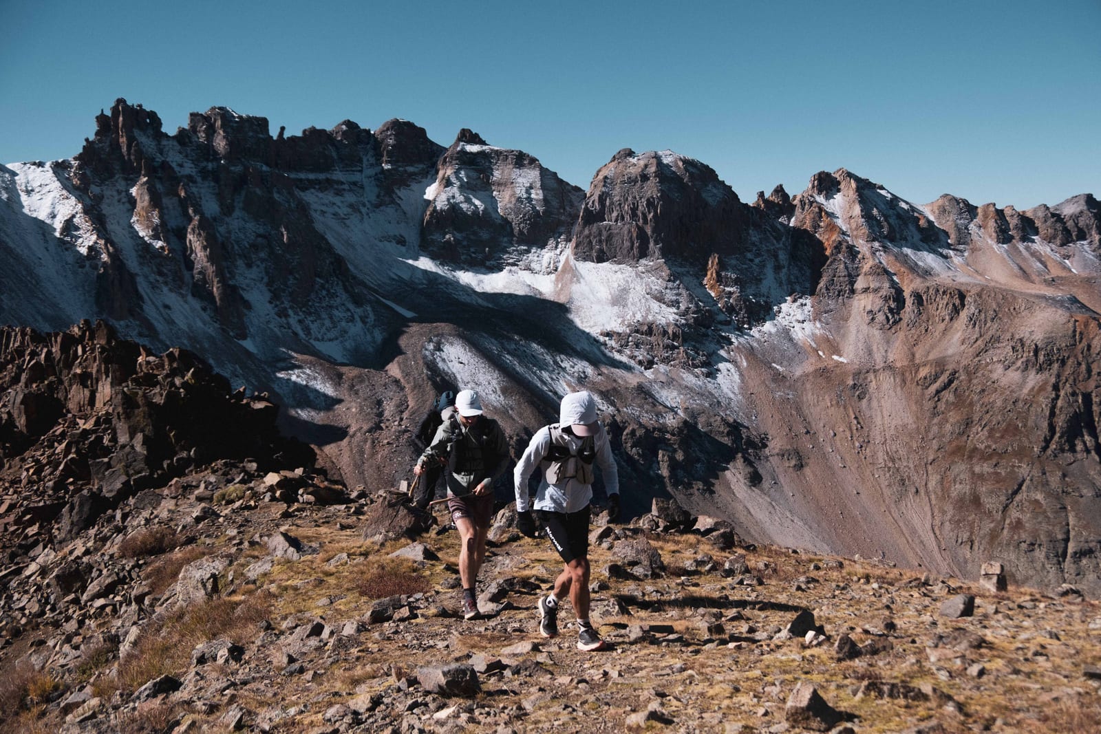 Two companions on the move, high in the Colorado fourteeners.